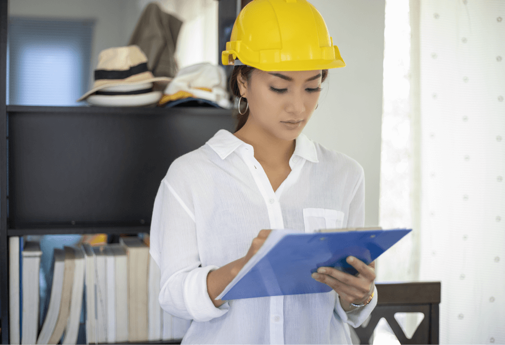 Lady Home Inspector Checking Papers
