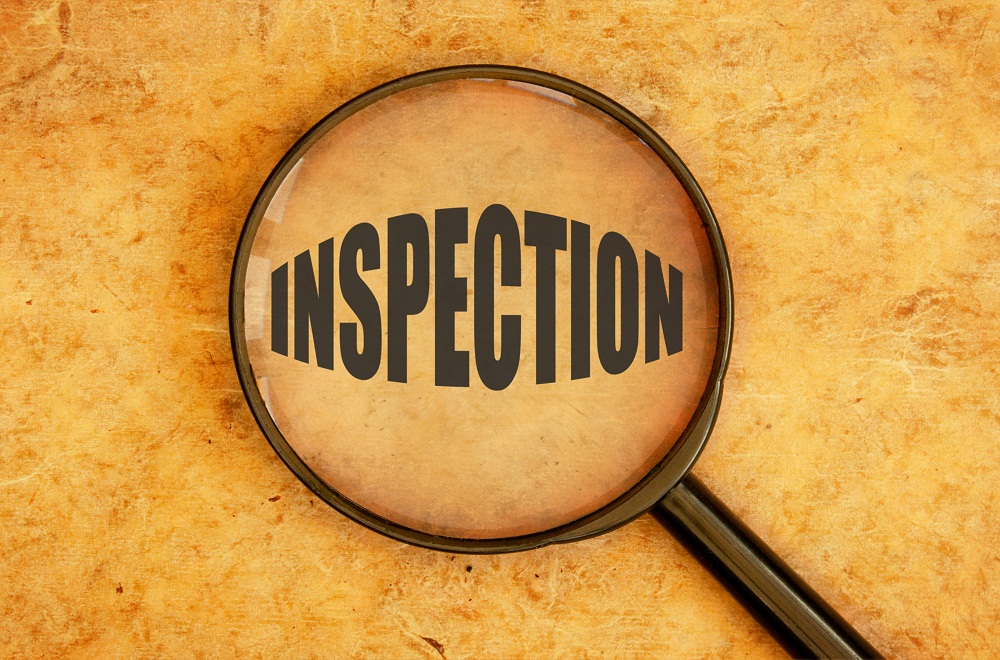Magnifying Glass Focusing on the Word Inspection